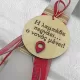Handmade Easter candle with engraved wooden message for godfather and elegant red ribbon decoration
