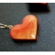 Handmade metallic heart earrings.