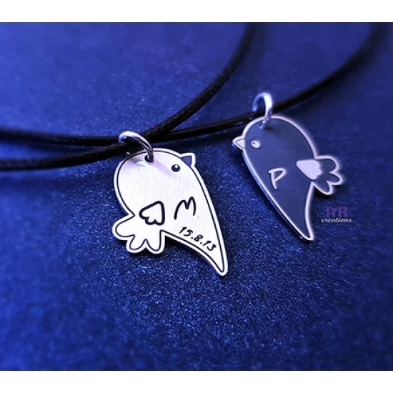 Silver pendant set with birds and your own engraving