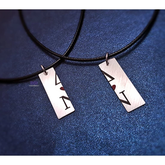 Set of silver tiles with initials and enamel (2 pcs)