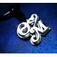 Silver key ring with two calligraphic monograms of your choice.