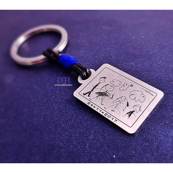 Silver keyring with your child's first drawing