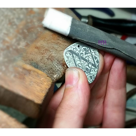 Silver guitar nib pendant with an initial of your choice engraved