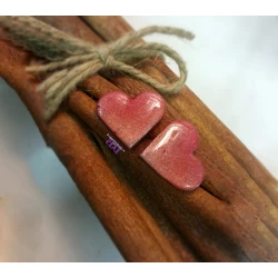 Handmade metallic heart earrings.