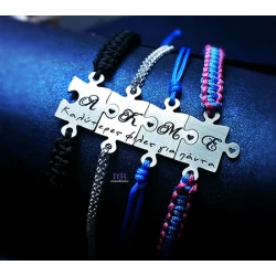 Set of four bracelets with a puzzle piece and your own engraving