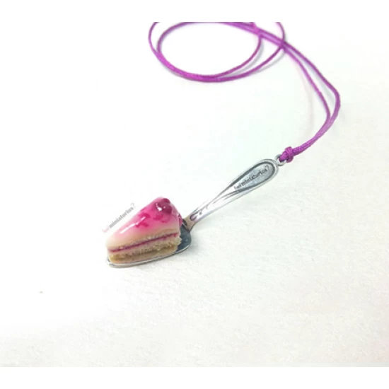 Necklace piece of cake on a serving spatula!