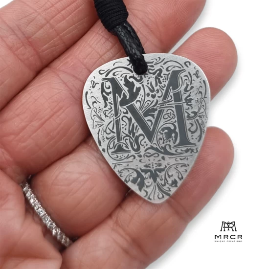 Silver guitar nib pendant with an initial of your choice engraved