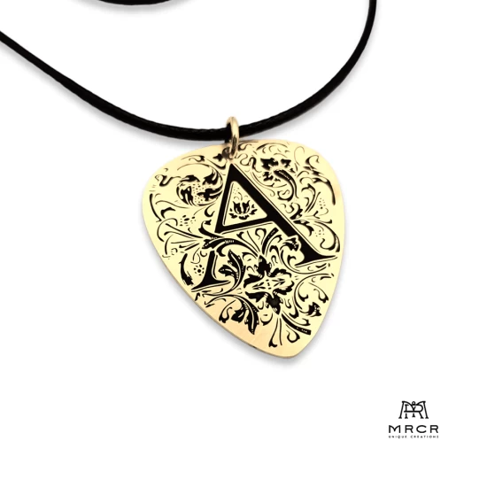 Silver guitar nib pendant with an initial of your choice engraved