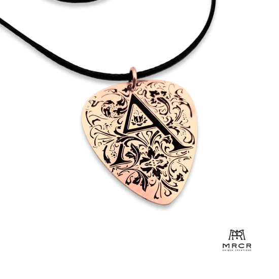 Silver guitar nib pendant with an initial of your choice engraved