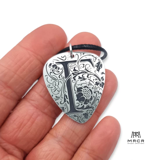 Silver guitar nib pendant with an initial of your choice engraved
