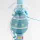 Easter candle with blue candle and blue wooden egg