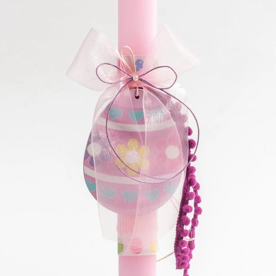 Easter candle with pink candle and pink wooden egg