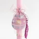 Easter candle with pink candle and pink wooden egg